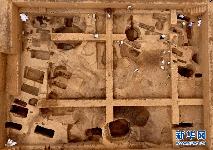 （图文互动）（1）考前职员初次大鹤发现商代铸铜工匠家族墓地